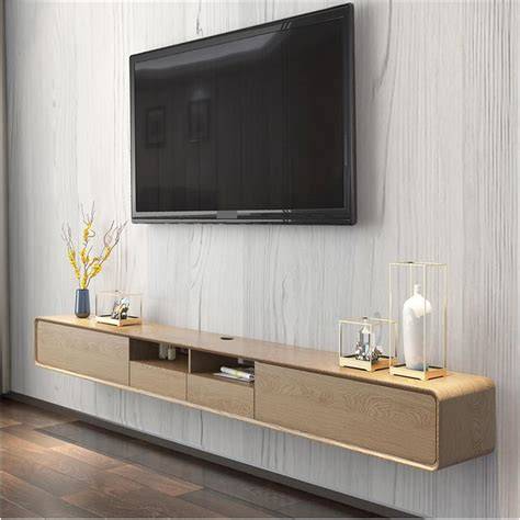 centro flotante moderno con televisor y cables