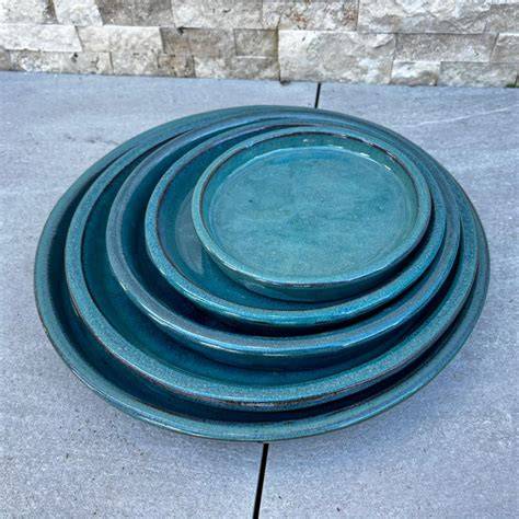 revestimiento metalizado terracota azul petróleo