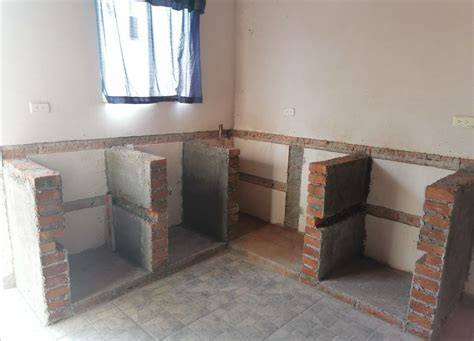 Construcción de bajo mesada de ladrillo