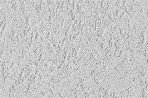 Material de estuco blanco con relieve