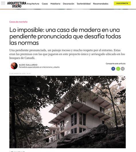 Casa de madera integrada en pendiente