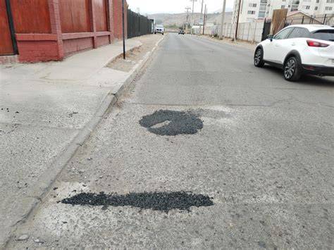 reparación de baches en calles urbanas