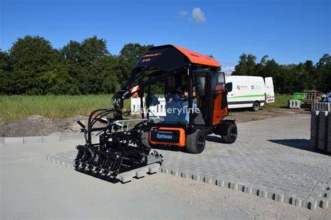 Máquina Holland colocando adoquines