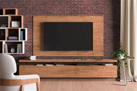 Pared de piedra detrás del televisor